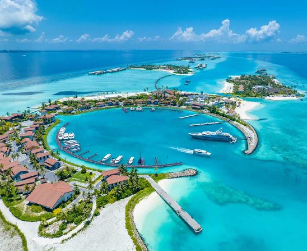 230516112548-01-crossroads-maldives-aerial